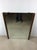 This mid century modern mirror features unique hardwood frame with original walnut finish, beveled glass edge with...