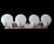 ​Bring coastal glamour and vintage sophistication to your powder room or bath with this stunning four-light vanity sconce....