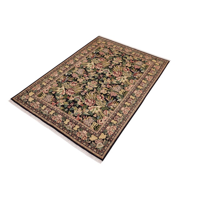 Designed with mesmerizing intricacy and gorgeous color palette, this hand-knotted masterpiece demonstrates the beauty and...