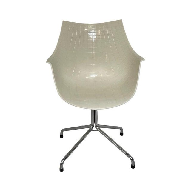 Iconic chair by Christophe Pillet for Driade. The design is based on the lines that rund on the longitude and latitude on...