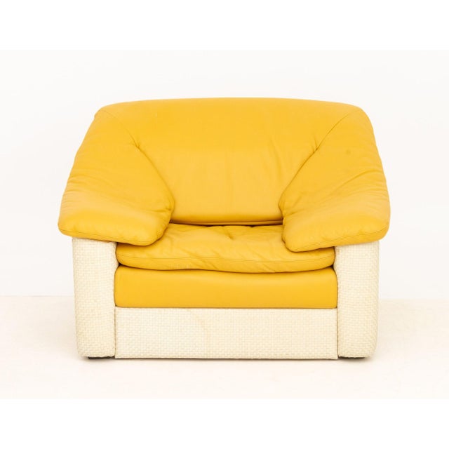 Gyform Yellow Leather Upholstered Lounge Chair, the undersides of the armrests marked and above woven leather base. 33" H...