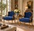 A pair of stunning Louis XV French Provincial style club chairs or lounge chairs. Carved walnut, with deep blue faux bois...