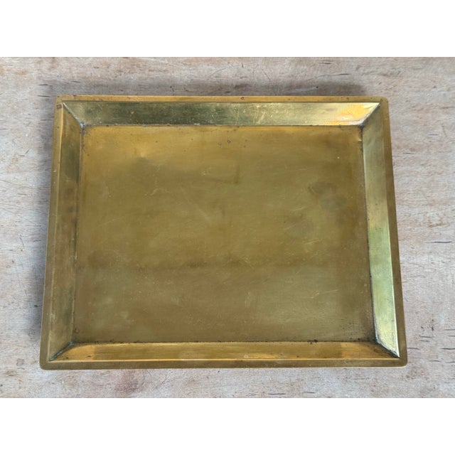 This is a lovely vintage brass tray from Bradley & Hubbard, stamped on the underside. Perfect for a vanity, bookshelf, or...