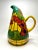 The exquisite shape of this large, yet light weight pitcher is hand-crafted mimicking the Tiffany style of stained glass...