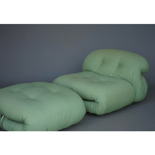 Iconic 1970s designed lounge chair and ottoman. This classic design combines a hard chromed metal frames that encloses...