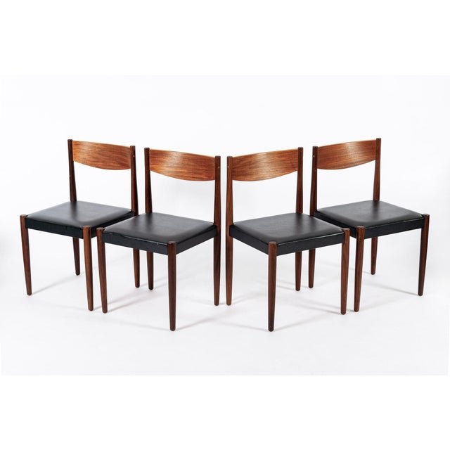 This lovely vintage mid century Danish modern set of four dining chairs was designed by Poul Volther for Frem Rojle and...