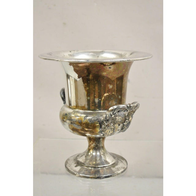 Vintage Distressed Trophy Cup Silver Plated Champagne Chiller Ice Bucket by Bristol. Circa Mid 20th Century. Measurements:...