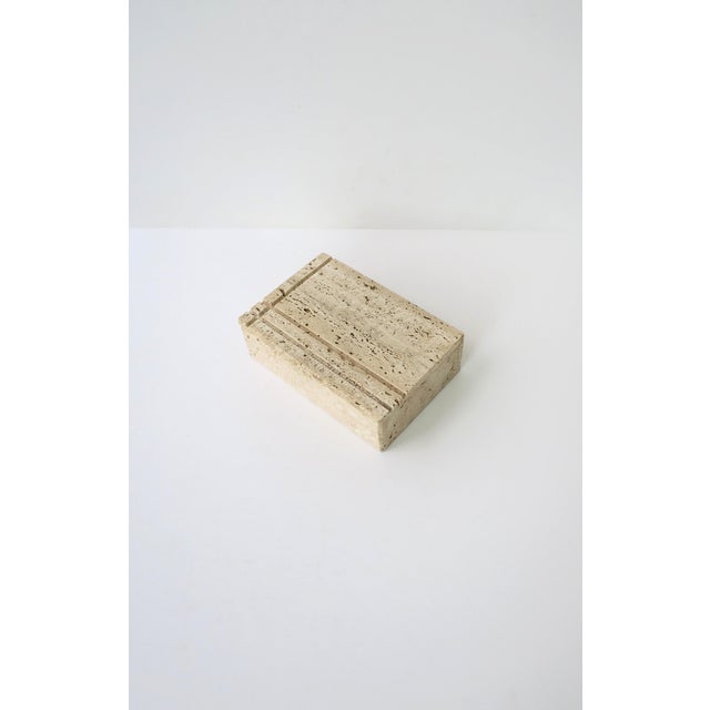 An Italian rectangular travertine marble box, attributed to designer Fratelli Mannelli, Postmodern design period, circa...