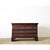 A striking Italian commode/chest of drawers from circa 1850, all hand-crafted from cedar that has taken on a deep mahogany...