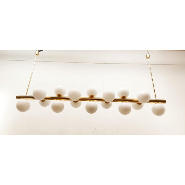 Sputnik Brass Suspension with 16 Glass Shades, in Very Good conditions. Designed 1970 to 1979 Up to 250V (Europe/UK...
