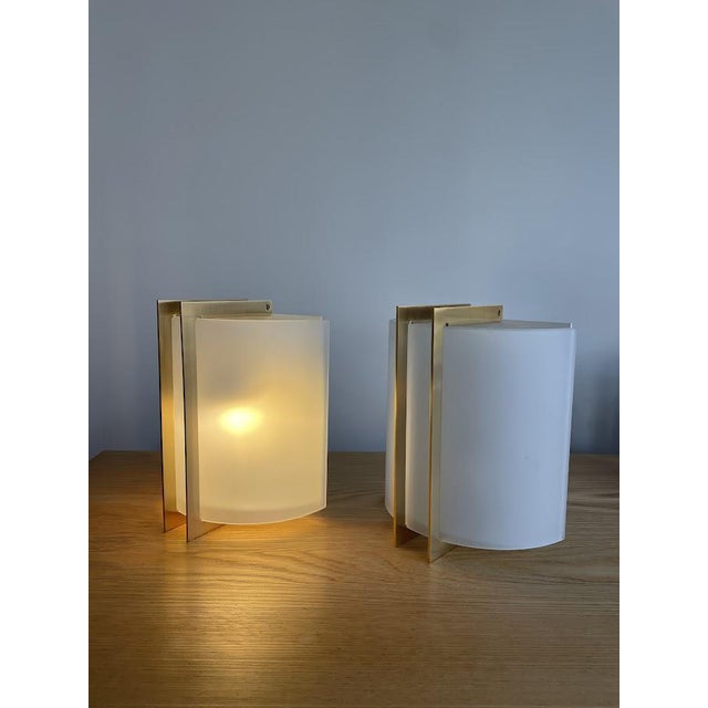 Elegant wall lamps that play with contrast. A duo that effortlessly draws attention. manufacturer: estiluz, spain...