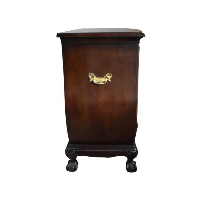 From the Drexel Heritage Heirloom Collection comes this exquisite serpentine four drawer mahogany bombe chest with its...