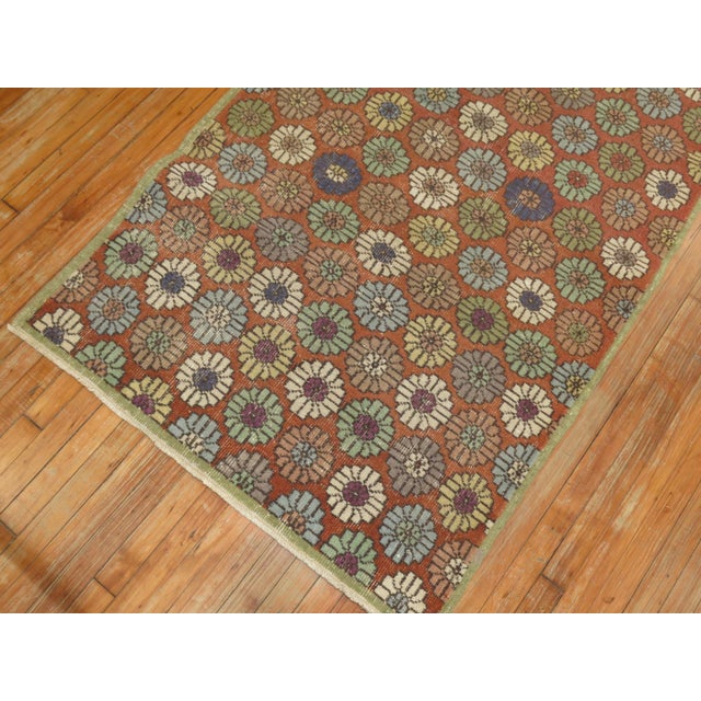 Soft red Turkish deco wide runner from the mid-20th century with an all-over repetitive design. A chic piece, circa...