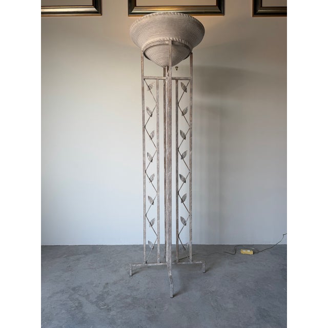 Striking 1980’s Postmodern sculptural torchère floor lamp featuring a dramatic uplight design with an architectural...