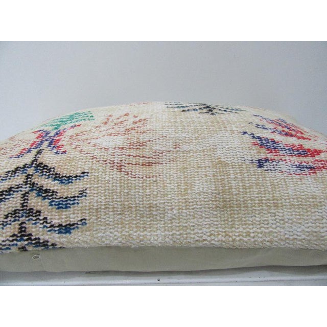 This is a pillow cover made from a vintage kilim rug. The piece was properly washed and ready to use. Pillow inserts not...