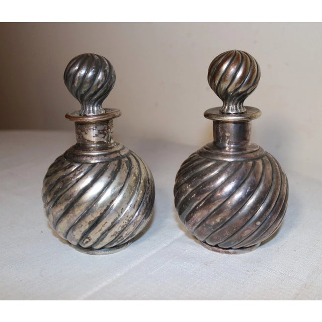 Up for sale is a wonderful pair of antique 19th century Victorian silver-plated scent bottles. the matching bottle feature...
