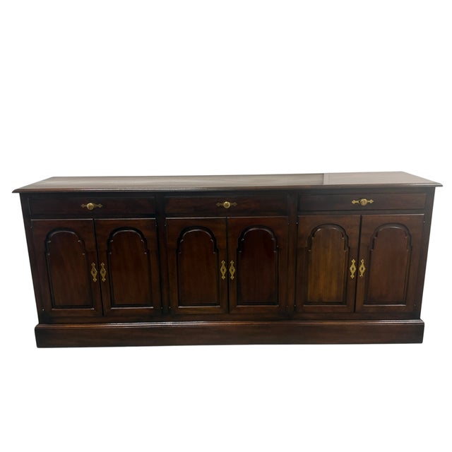 This is a vintage mahogany buffet or sideboard by Kittinger Furniture of Buffalo, New York. Substantial in scale and...