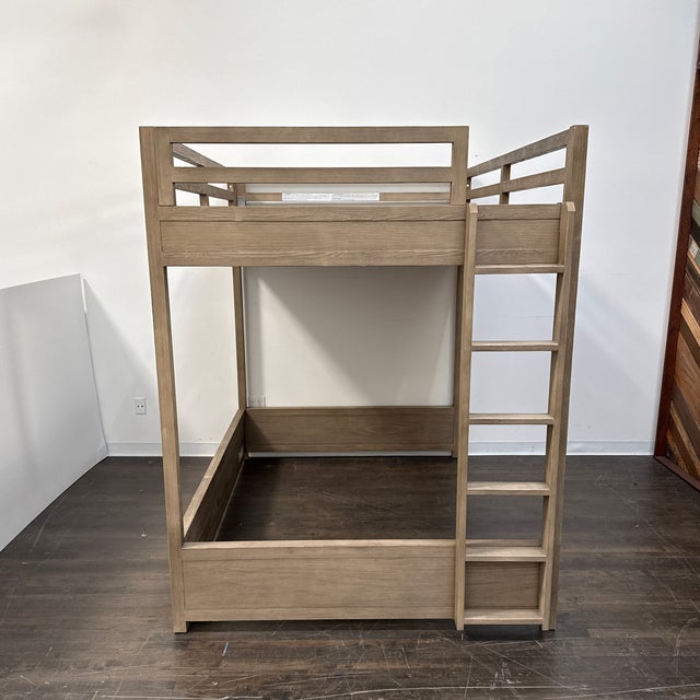 Design Plus Gallery presents a Full-Size Restoration Hardware Teen Laguna Loft Bed. The design combines a raised full-size...