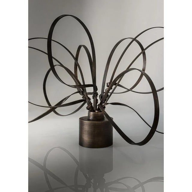 Bronze Swirls sculpture by Art Flower Maker Unique Piece. Dimensions: Ø 58 x H 30 cm. Materials: Hand Painted Bronzed...