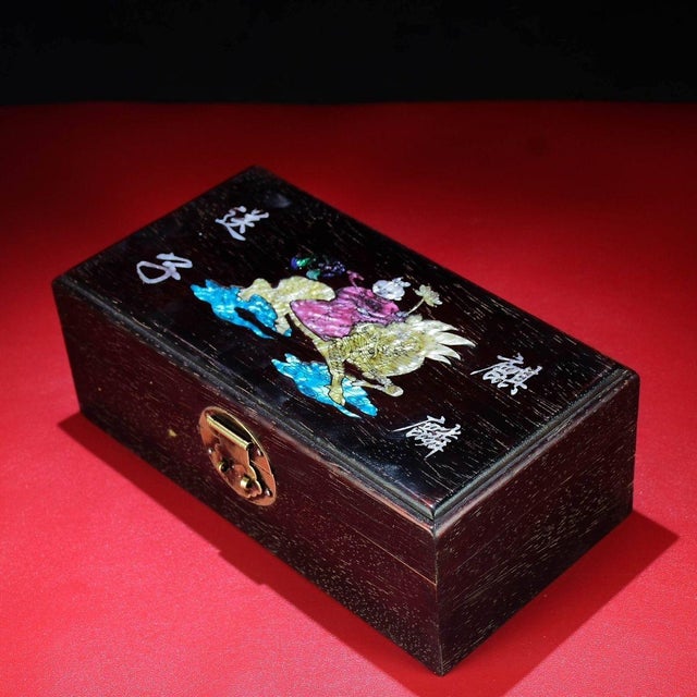 This is a fascinating vintage Chinese jewelry box or storage chest, crafted from dense dark hardwood (likely Rosewood /...