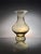 This high quality amber colored glass art vase is attributed the German manufacturer WMF, who produced impressive objects...