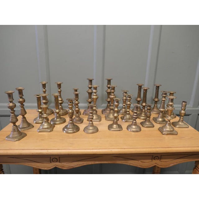 Collection of 27 Brass Candle Sticks, Pub Decor, Theatre Props These are quite a large collection approximately 27...
