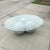 This vintage coffee table with three 13" molded plastic or fiberglass conjoined spheres. The finish is starting to crack...