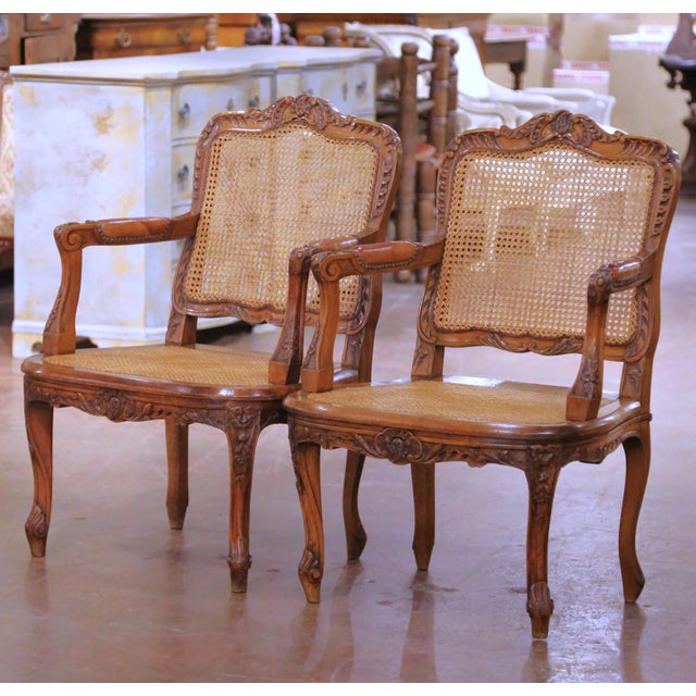 This refined pair of mid-century French desk armchairs was crafted in France circa 1960 and reflects the enduring...
