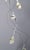 Hanging, patinaed copper wire with handmade paper and cast glass flowers. Item is unmarked, arrives with certificate of...
