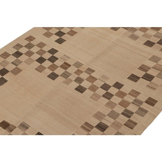 This vintage 6x8 Persian kilim is believed to be a tribal rug of the Shushtar region of Iran. On the Design: Handwoven in...