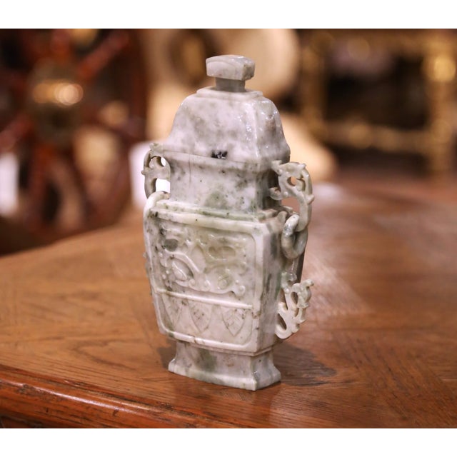 Bring refinement and sculptural elegance to a console, étagère, or writing desk with this beautifully carved vintage...