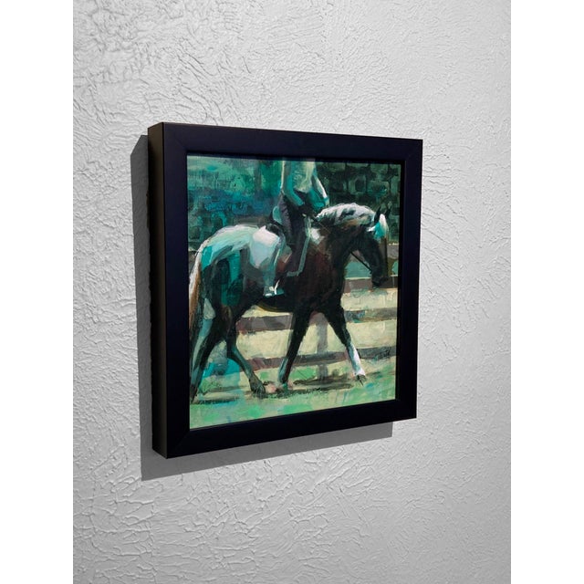 Balanced Carriage captures a moment of graceful interaction between horse and rider, emphasizing their harmonious...