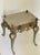 Unique design by Classic Workshops NY - stainless steel small side table decorated with brass handles and lion heads,...