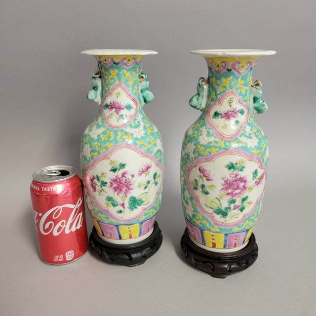 A charming matched pair of Chinese famille rose porcelain vases, dating to the late Qing or early Republic period (circa...