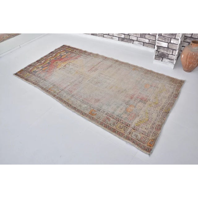 Orange Vintage Distressed Turkish Area Rug, Faded Traditional Motif in Muted Earth Tones For Sale - Image 8 of 9