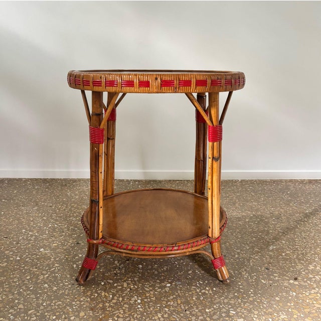 Authentic, typical French bistro style side table. Two round, wooden shelves, bamboo feet with edges and decorative...