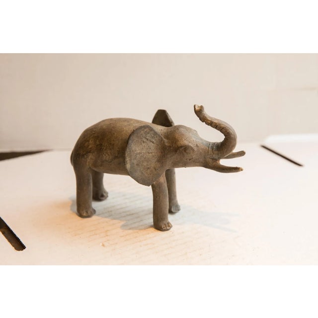 :: Vintage handmade African elephant sculpture. Circa late mid 20th century, though possibly older, this piece has such...