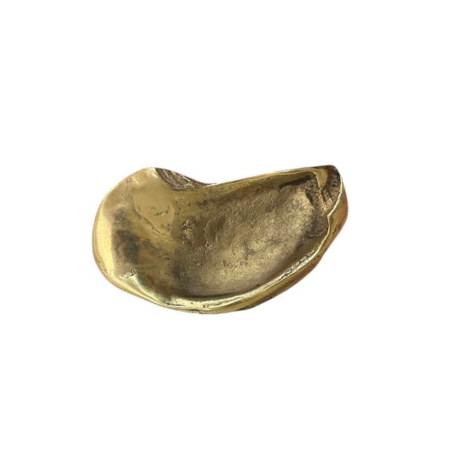 A lovely, vintage brass oyster shell dish. Features solid brass casting in an oyster shell form. Cast from an actual...