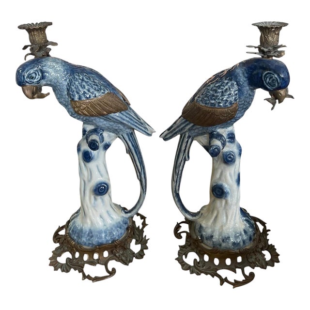 A Pair of Vintage Hollywood Regency Style Blue & White Ceramic Parrot Candle Holders For Sale