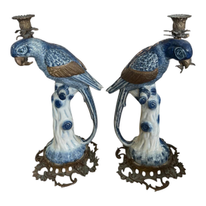 A Pair of Vintage Hollywood Regency Style Blue & White Ceramic Parrot Candle Holders