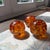 Vintage Amber Controlled Bubble Art Glass Orbs – Set of 3 Murano Style Paperweights For Sale - Image 4 of 7