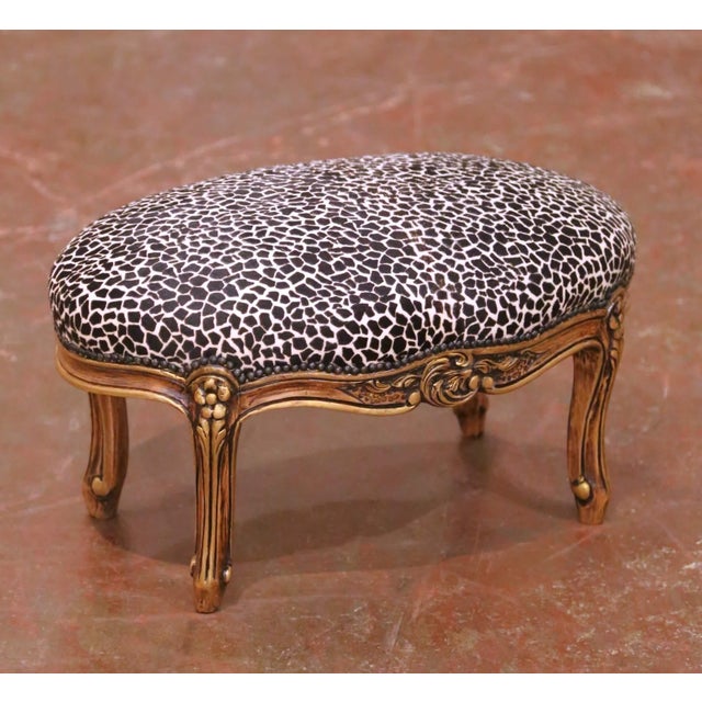 Add a touch of elegance to a bedroom or sitting area with this antique footstool. Crafted in France circa 1960, the oval...