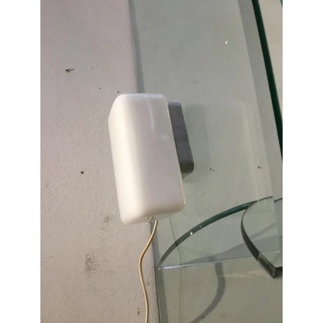 Some damage on the porcelain, see picture, not visible when it is hanging. Lamp holder e14 This piece has an attribution...