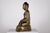 This inscribed and dated bronze Burmese Buddha from the Mandalay period depicts Shakyamuni in bhumisparsha mudra, the...