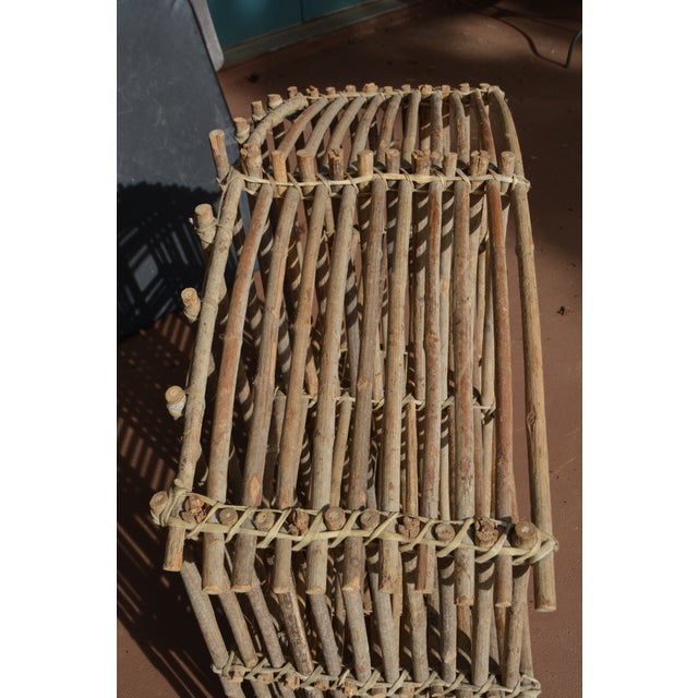 This vintage shelf has been around for over 30 years. Twig wood & rawhide banding. It was hung on a wall, almost above a...