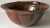 This fabulous large handmade studio art pottery bowl features abstract patterns in Black on a rich Brown ground.12" x 12"...