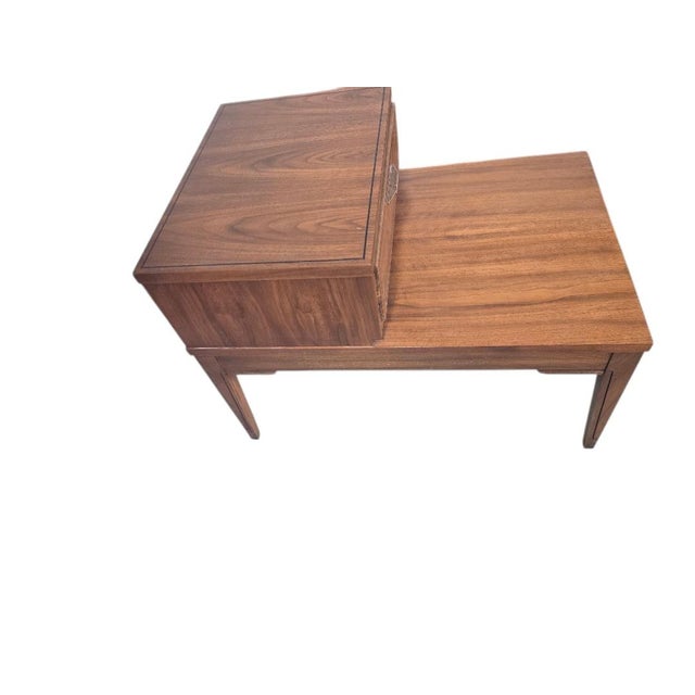 Add a touch of modern elegance to your living space with this 3-piece set of Kent Coffey coffee and side tables. Crafted...