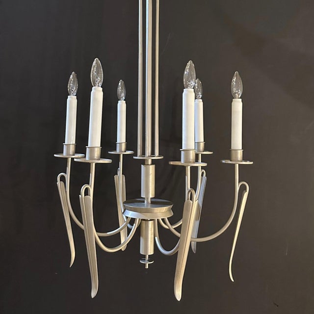 A handsome Art Deco period eight arm nickel chandelier from Germany circa 1930.