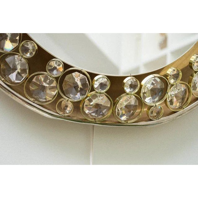 Some mirrors reflect light. This one creates it. A 1960s masterpiece by Palwa, this illuminated mirror is more than just a...