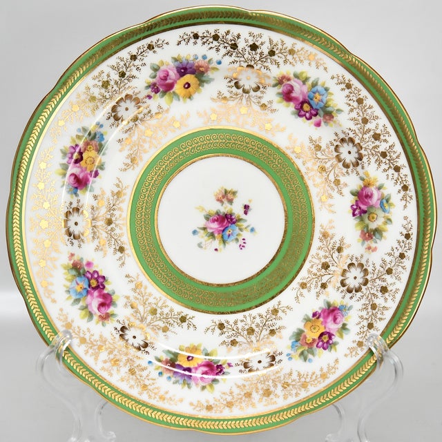 Alluring and beautiful, these plates are hand painted with enamel colors and richly gilded with hand applied high karat...